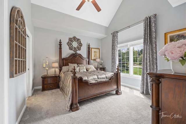 bedroom with lofted ceiling, light colored carpet, and ceiling fan