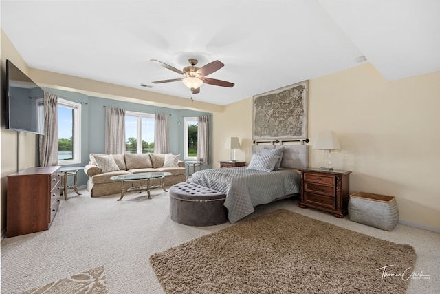 bedroom featuring ceiling fan and carpet floors