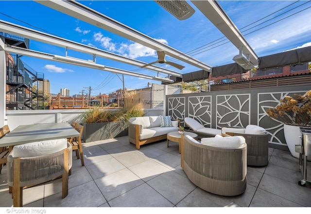 view of patio featuring outdoor lounge area and a pergola