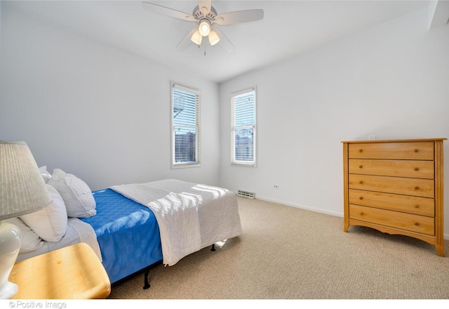 bedroom with ceiling fan and carpet flooring