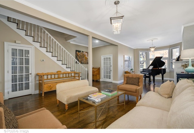 living room with ornamental molding and dark hardwood / wood-style floors