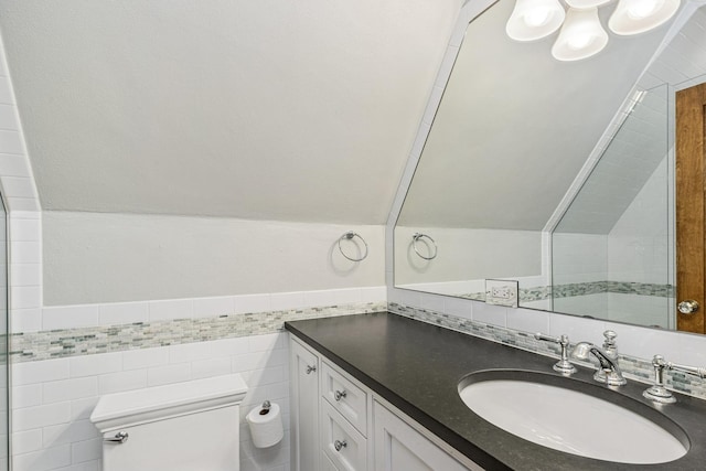 621 E Prospect Ave, Lake Bluff, IL 60044 - bathroom featuring toilet, vanity, and tile walls