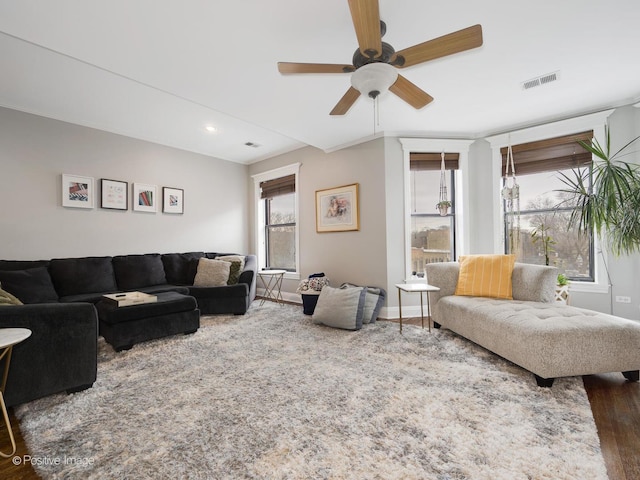 living room featuring ceiling fan