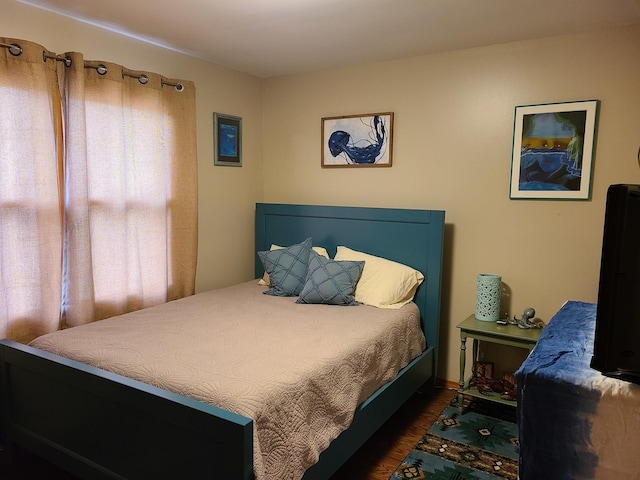 bedroom featuring dark hardwood / wood-style floors