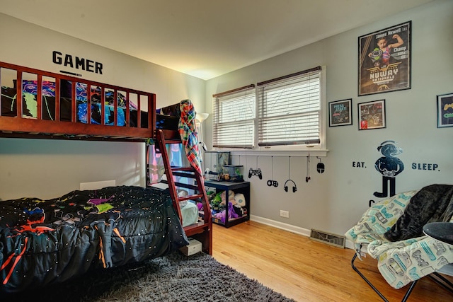 bedroom featuring hardwood / wood-style floors