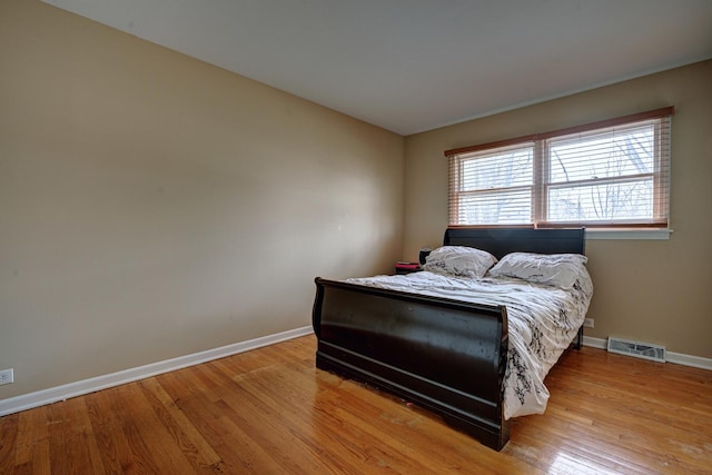 bedroom featuring light hardwood / wood-style flooring