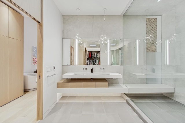 bathroom featuring vanity and a stall shower