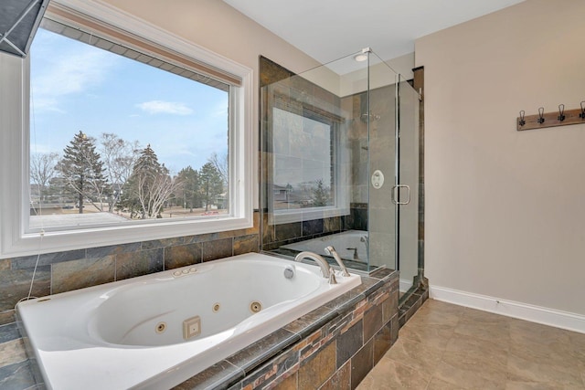 bathroom with shower with separate bathtub