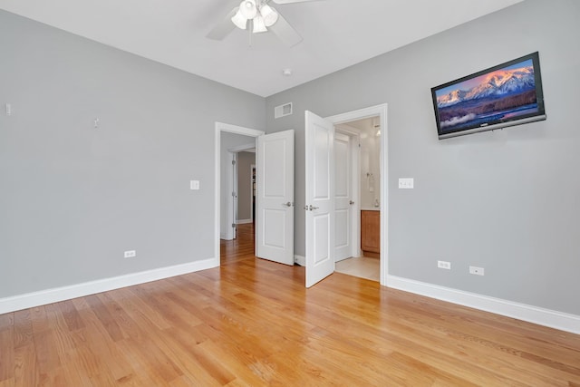 unfurnished bedroom featuring ceiling fan and light hardwood / wood-style floors