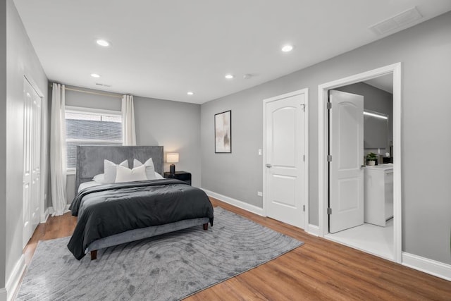 bedroom featuring wood-type flooring