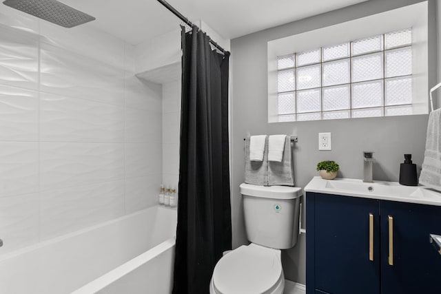 full bathroom with vanity, toilet, and shower / bath combo with shower curtain