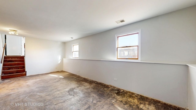 spare room featuring visible vents