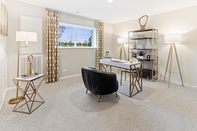 office area featuring light colored carpet