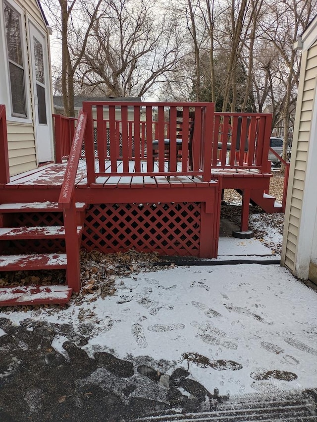 view of snow covered deck