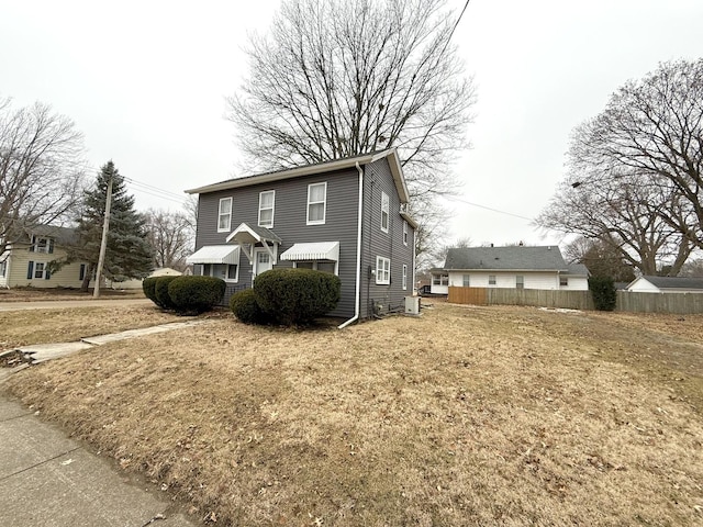 front facade with a front lawn