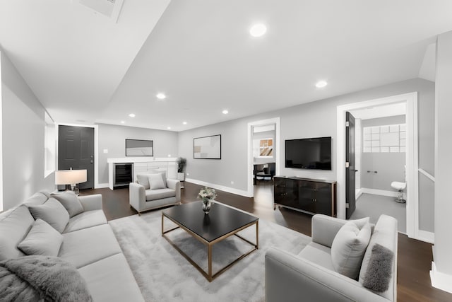 living room featuring wine cooler and wood-type flooring