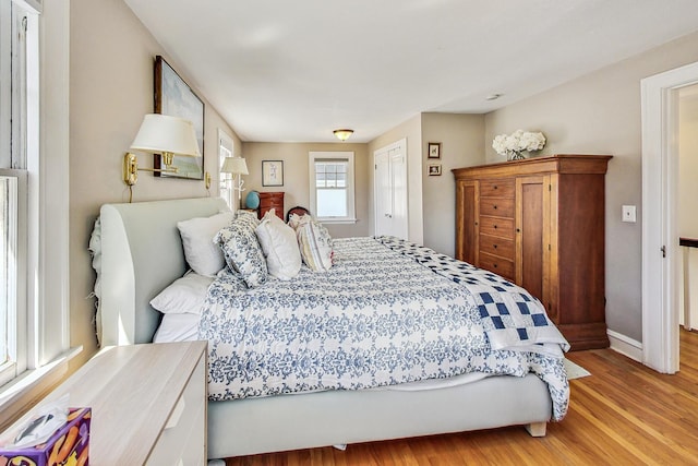 bedroom featuring light wood-type flooring