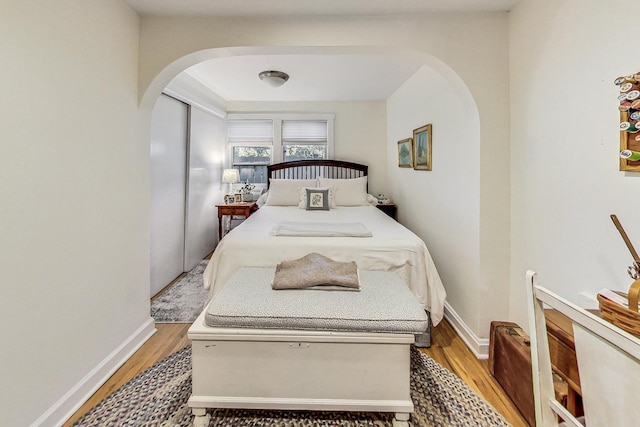 bedroom with light hardwood / wood-style floors