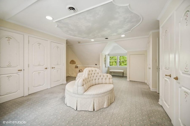 sitting room with lofted ceiling