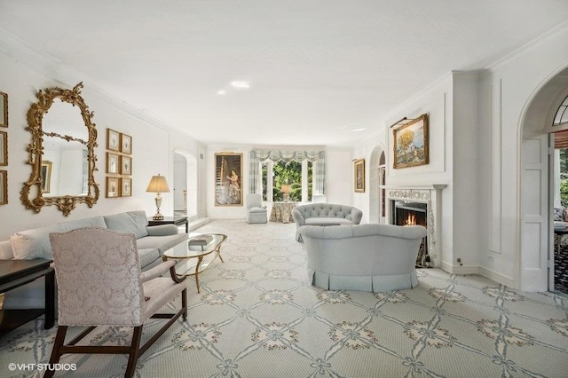 living room featuring ornamental molding and light carpet