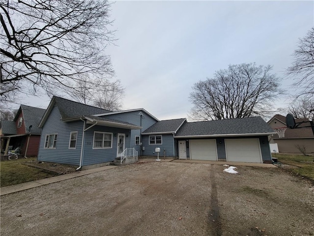 ranch-style house featuring a garage