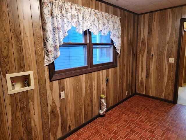 spare room with wooden walls