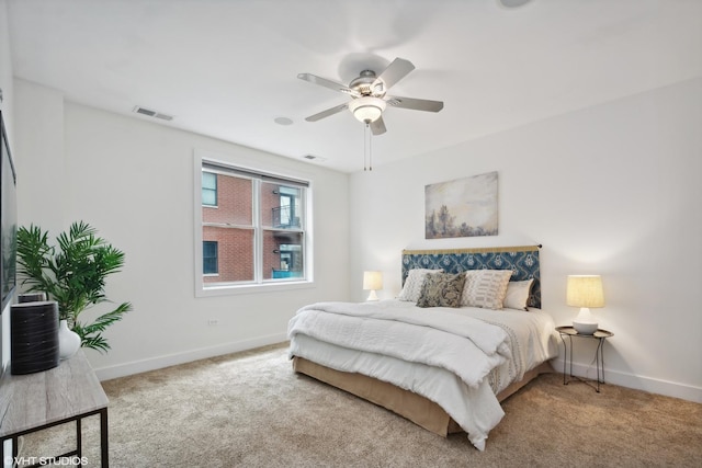 carpeted bedroom with ceiling fan