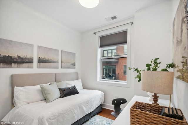 bedroom featuring hardwood / wood-style floors