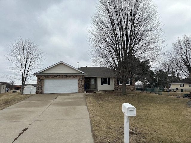 single story home with a garage and a front lawn