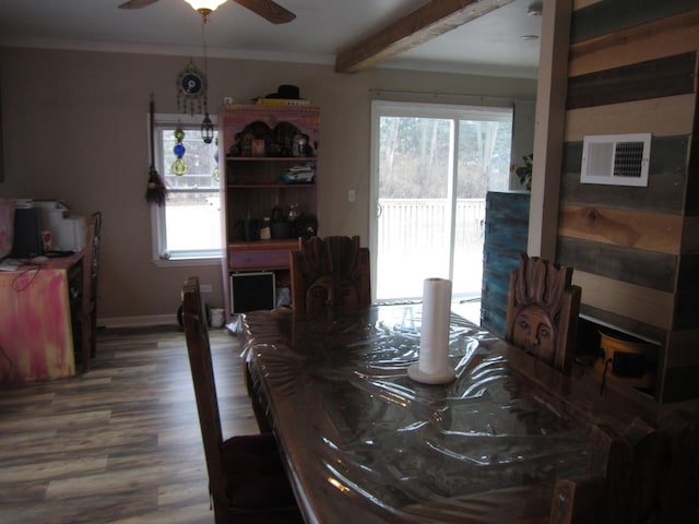 dining area featuring hardwood / wood-style flooring, ceiling fan, crown molding, and beam ceiling