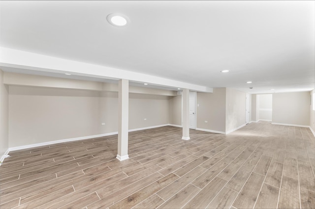 basement featuring light wood-type flooring