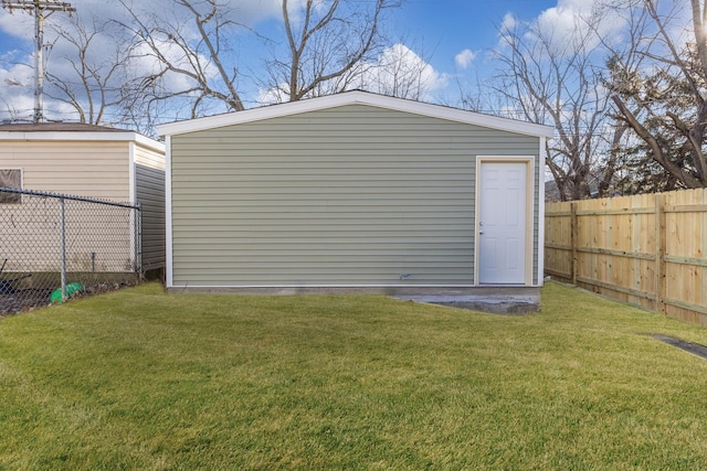 view of outdoor structure with a lawn