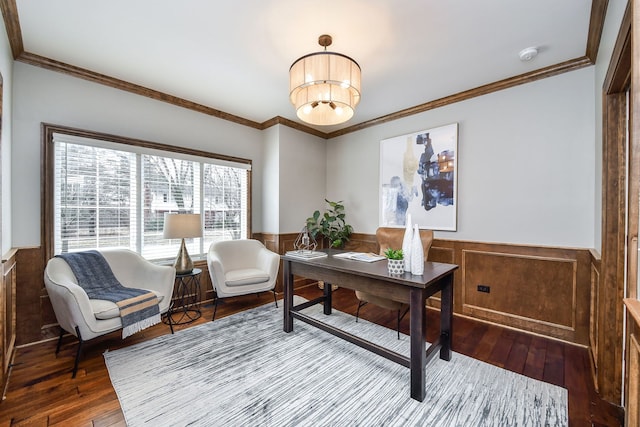 office featuring wood-type flooring, ornamental molding, a notable chandelier, and wainscoting