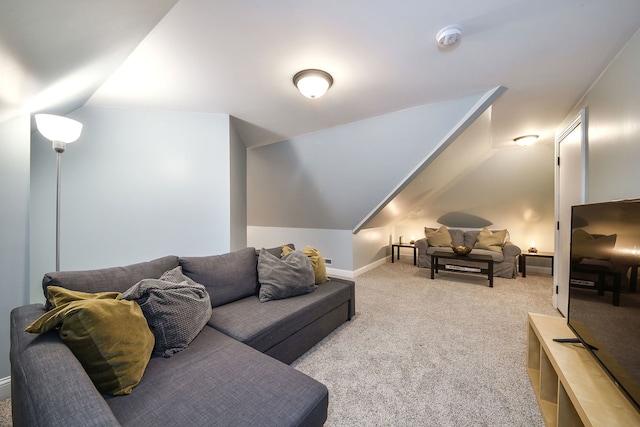 living room with carpet and vaulted ceiling