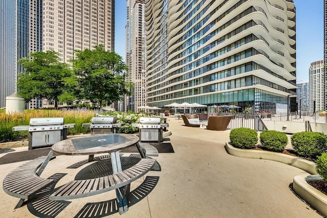 view of property's community featuring a patio area