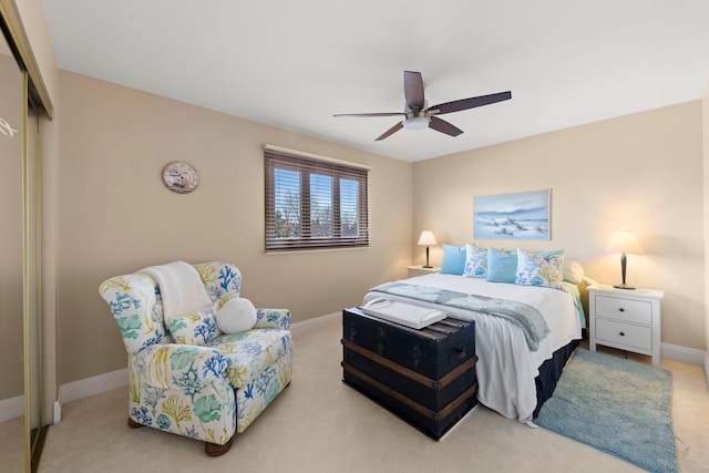 bedroom featuring ceiling fan and a closet