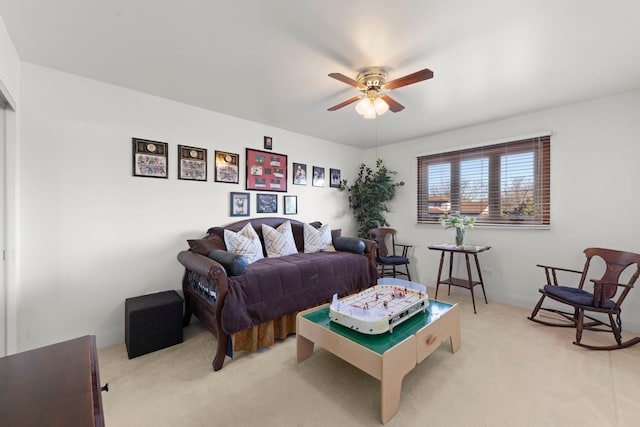 bedroom with light carpet and ceiling fan