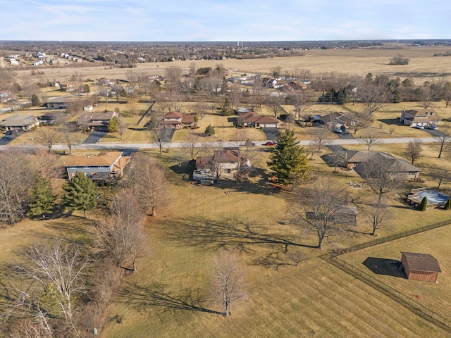 birds eye view of property featuring a rural view