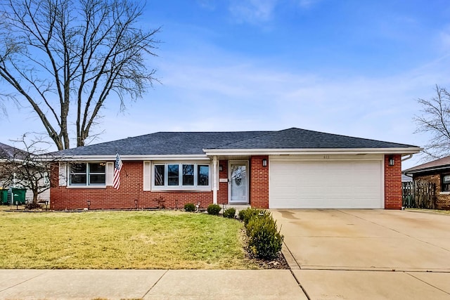 ranch-style house with a garage and a front yard