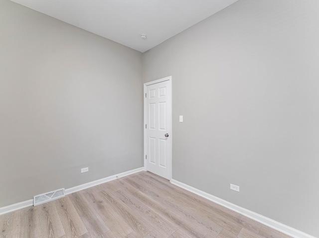 unfurnished room featuring light hardwood / wood-style floors