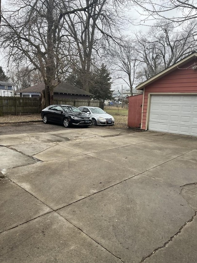 view of parking featuring a garage