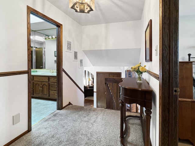 carpeted entryway featuring sink