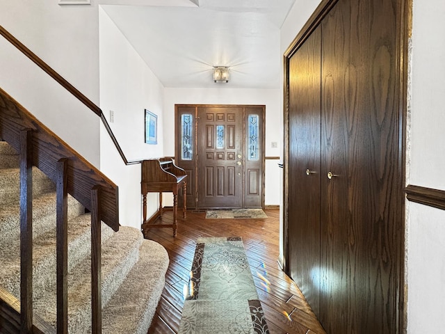 foyer entrance with wood-type flooring