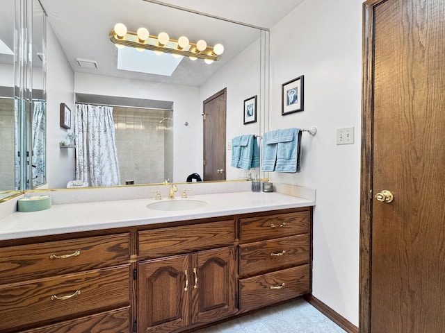 bathroom featuring vanity and a shower with curtain