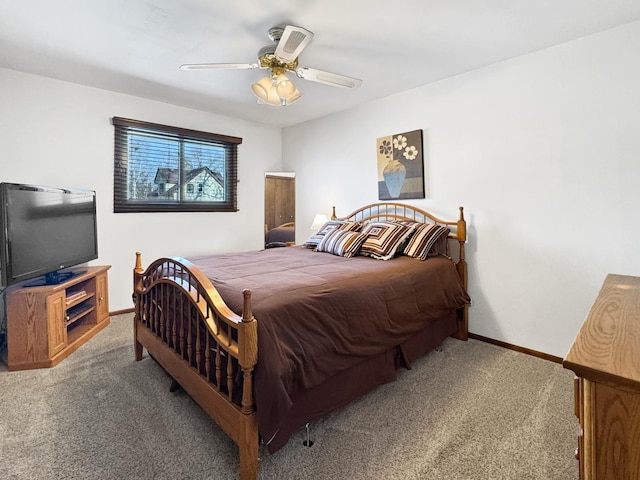 bedroom with ceiling fan and carpet flooring