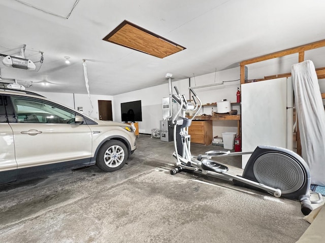 garage featuring a garage door opener