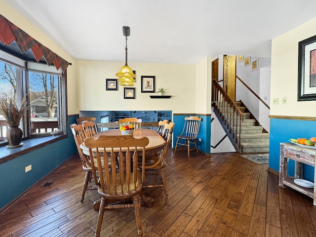 dining room featuring dark hardwood / wood-style floors