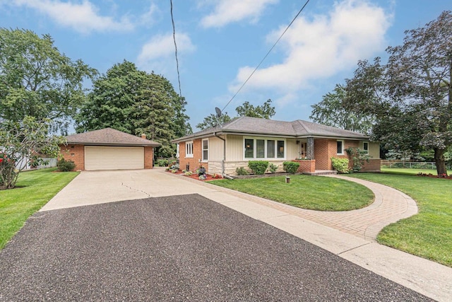 single story home featuring a front yard, an outdoor structure, and brick siding