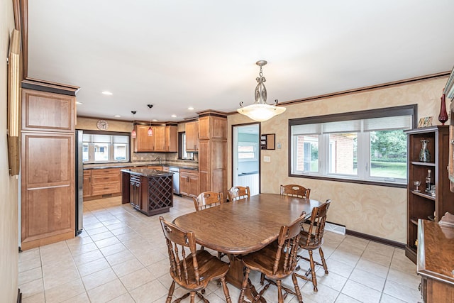 dining area with baseboards, light tile patterned floors, a healthy amount of sunlight, and recessed lighting