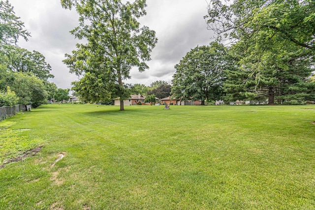 view of yard with fence